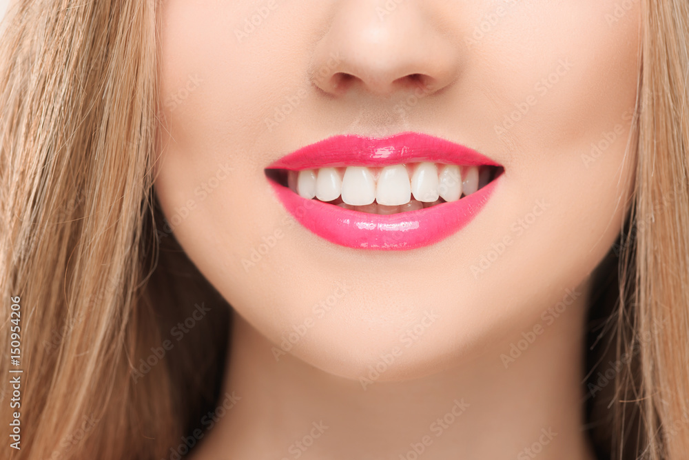 The sensual red lips, mouth open, white teeth. The sensual red lips, mouth open, white teeth.