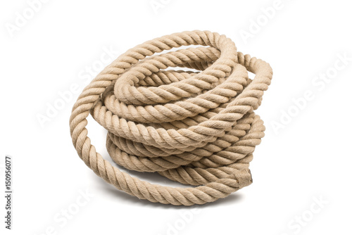 Pile of thick sturdy hemp rope on white background photo