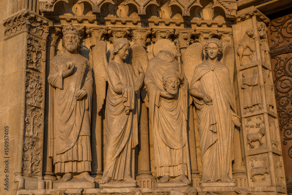Statues in the facade of the Notre Dame in Paris, France 