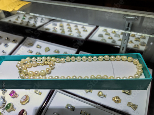 Strand of Pearls on a jewelry shop counter