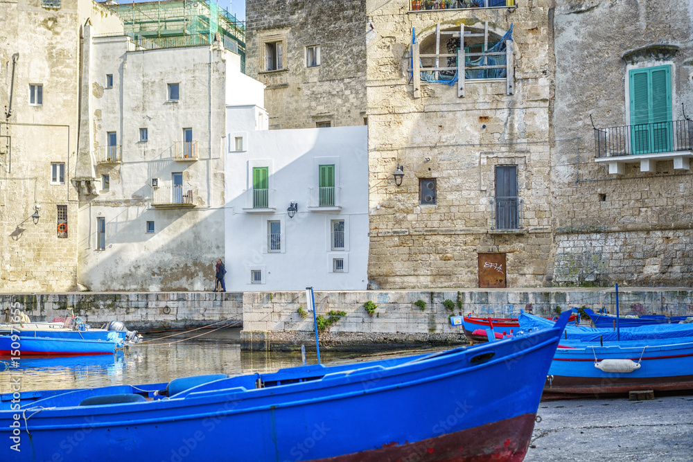 Blue boats in seaport of Monopoli, Italy