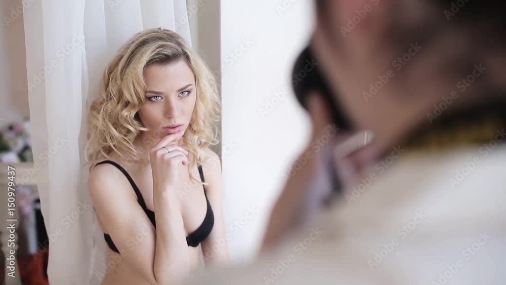Female portrait of cute lady in black bra indoors Female portrait of cute lady in black bra indoors