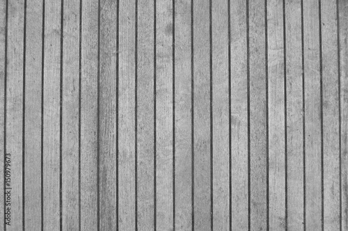 gray old wooden fence. wood palisade background. planks texture