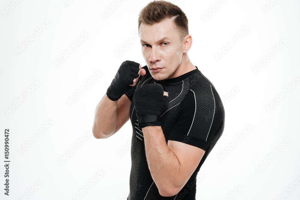 Sportsman boxer standing isolated over white background Sportsman boxer standing isolated over white background