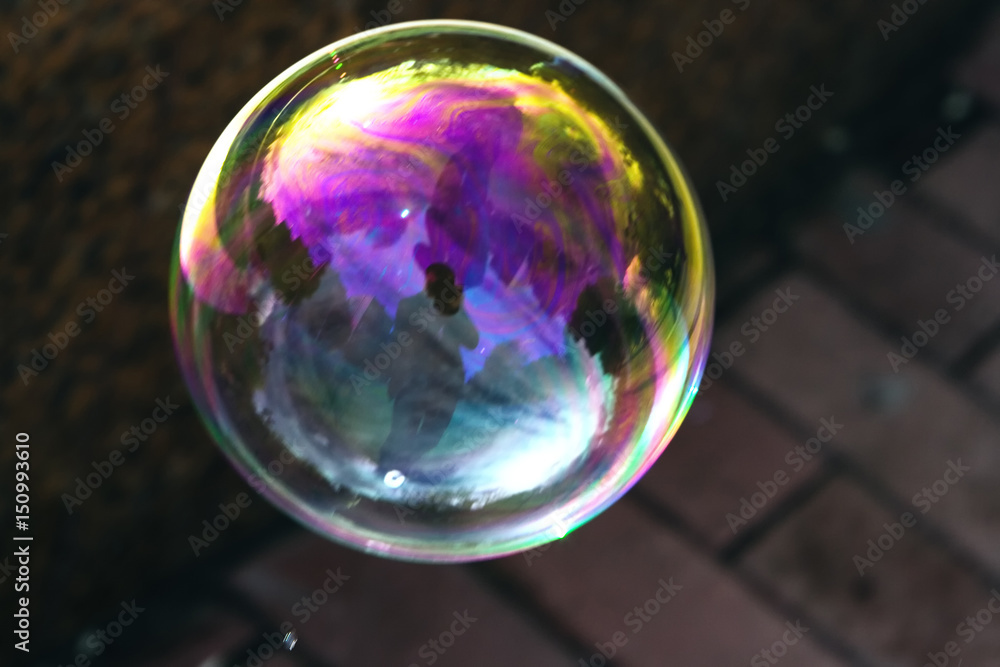 A beautiful soap bubble with reflections and overflows. A beautiful soap bubble with reflections and overflows.