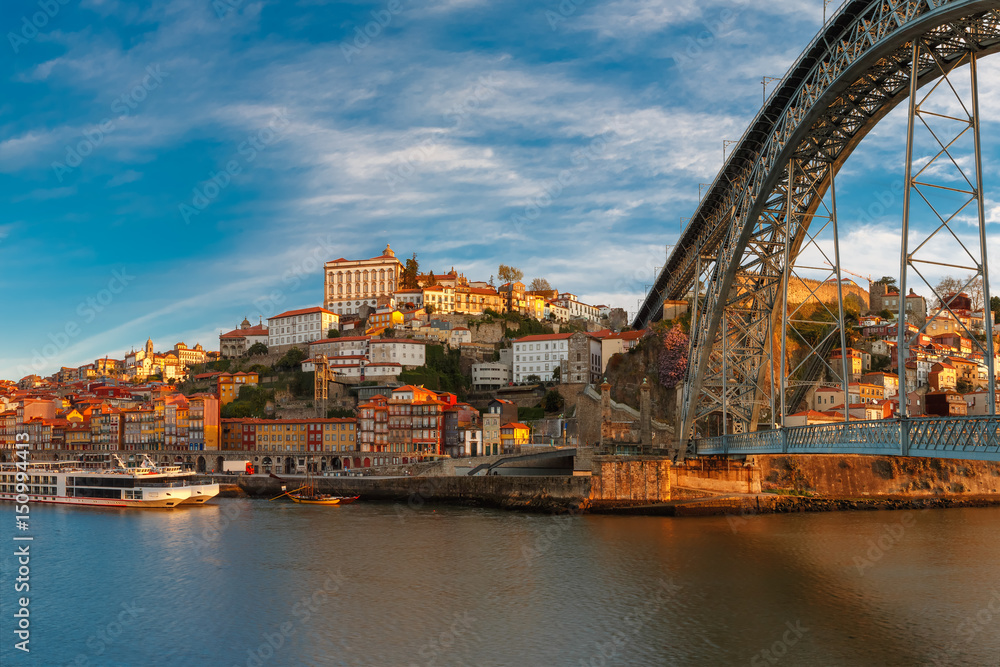 Douro river, Ribeira and Dom Luis I or Luiz I iron bridge in the sunny morning Porto, Portugal.