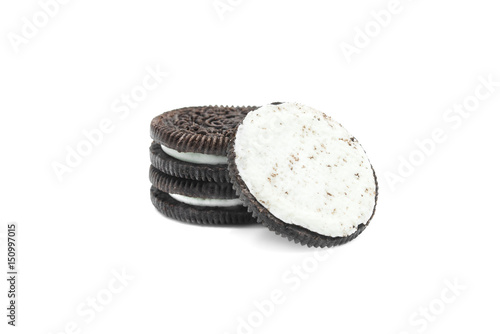 Chocolate cream cookies on white background.