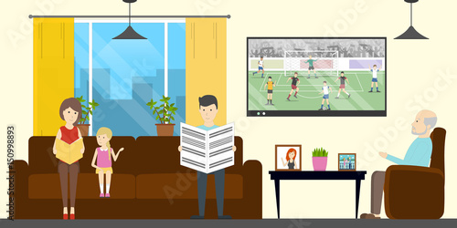 Family in living room. Sofa and TV.