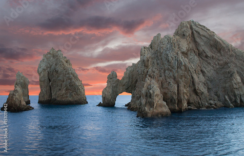 Beautiful large rocks in ocean at sunset Los Cabos Mexico photo