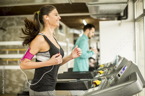 Young woman running on the ...