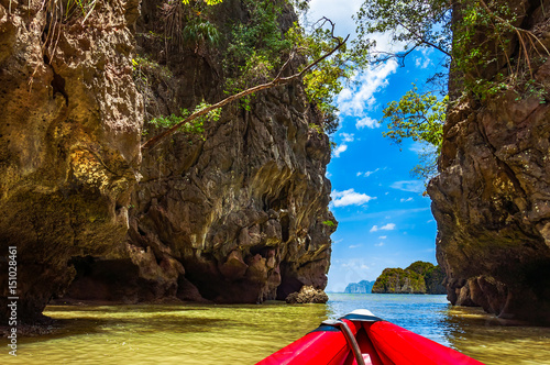 Large cliff limestone rocks in Phang nga bay for kayaking paddling pass through and explore, Thailand