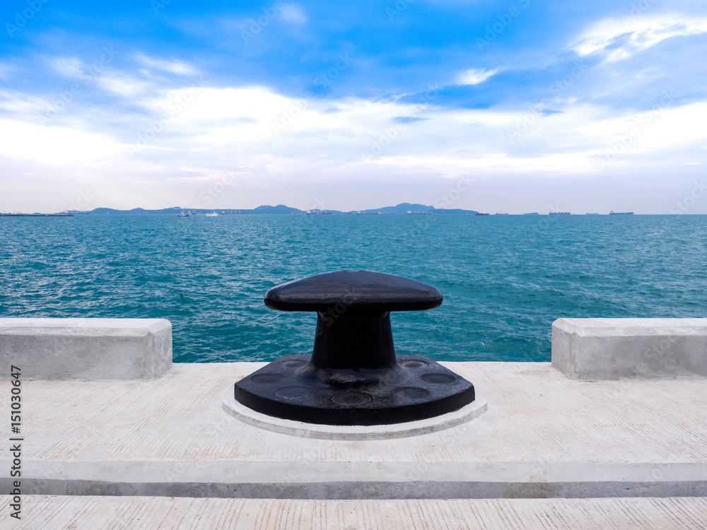 The new mooring bollard to settle on the dock of concrete  at port of thailnd