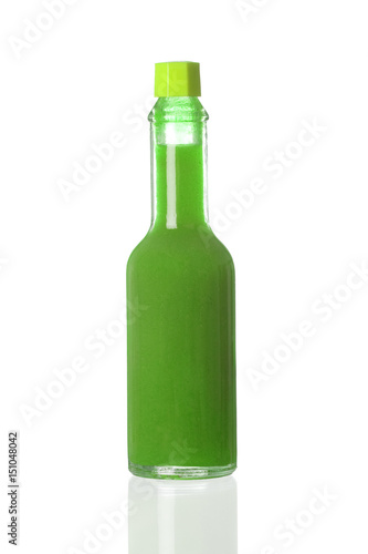 Green spicy sauce in a little bottle