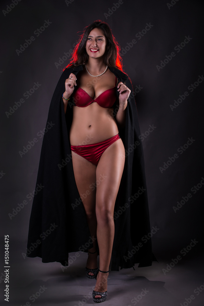 Sexy woman in red lingerie smiling Sexy woman in red lingerie smiling