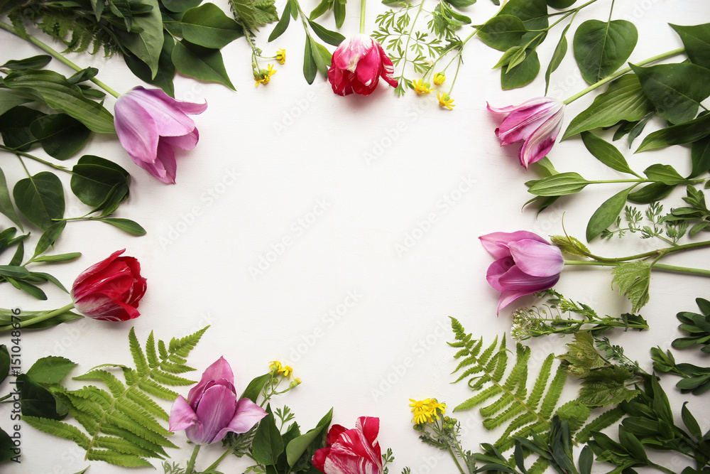 Tulips and lilacs and leaves top view Tulips and lilacs and leaves top view