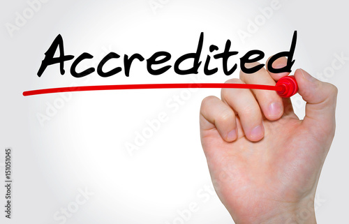Фотография Hand writing inscription Accredited with marker, concept