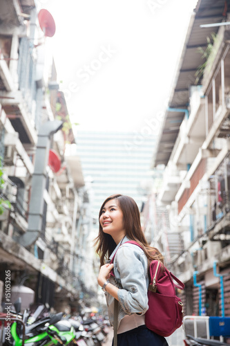 Young asian lady traveling in the city