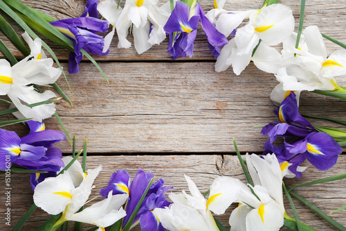 Fototapeta Naklejka Na Ścianę i Meble -  Bouquet of iris flowers on grey wooden table