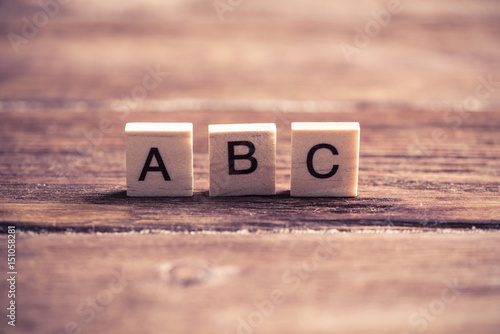 wooden elements with the letters collected in the word abc