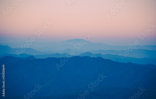 Beautiful sunset in mountain and fog landscape. © NaMong Productions