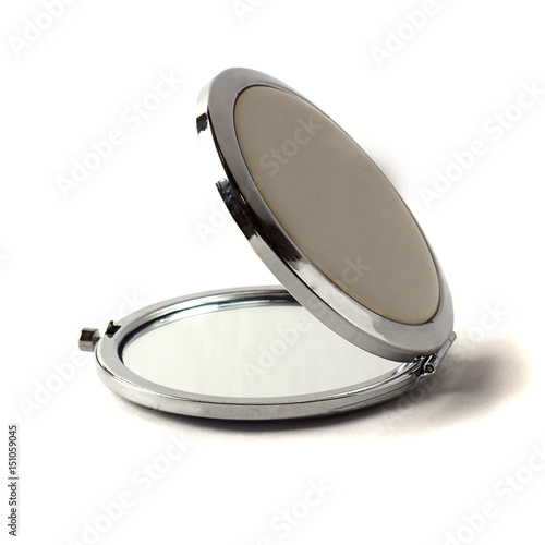 Pocket makeup mini mirror isolated on white