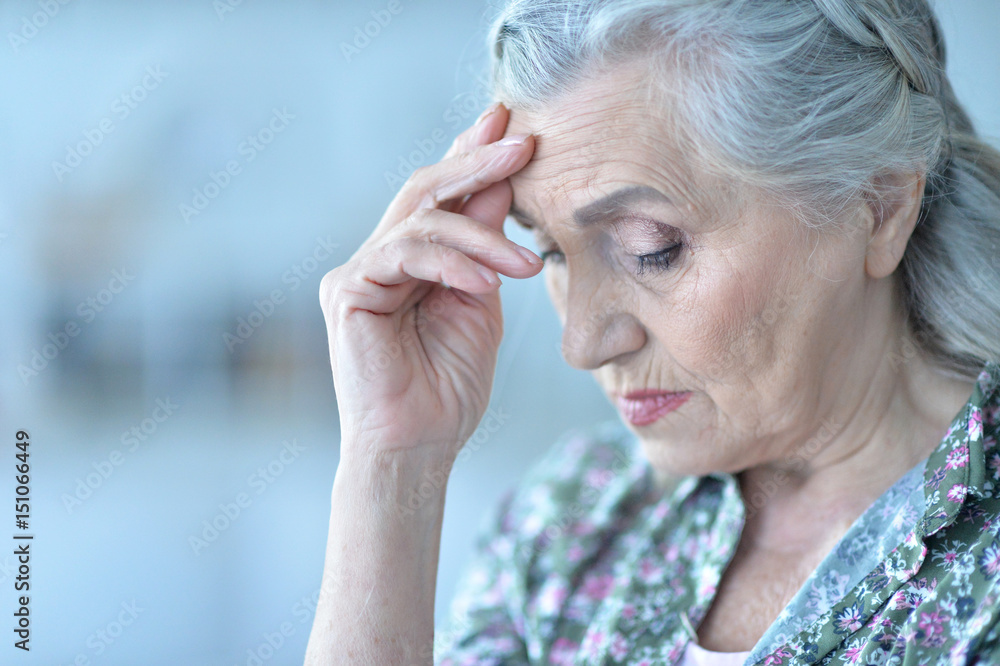 Beautiful sad elderly woman close-up Beautiful sad elderly woman close-up