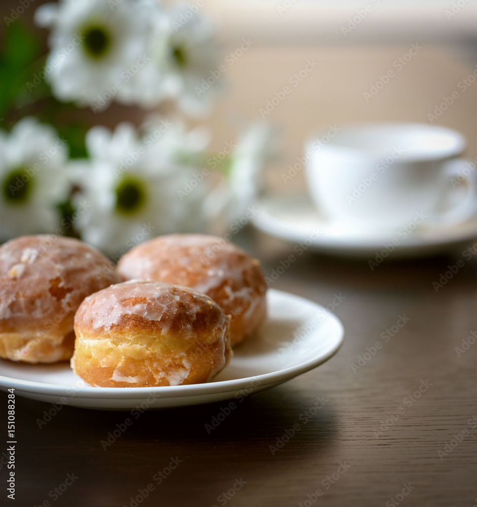 Donuts with flowers on a table