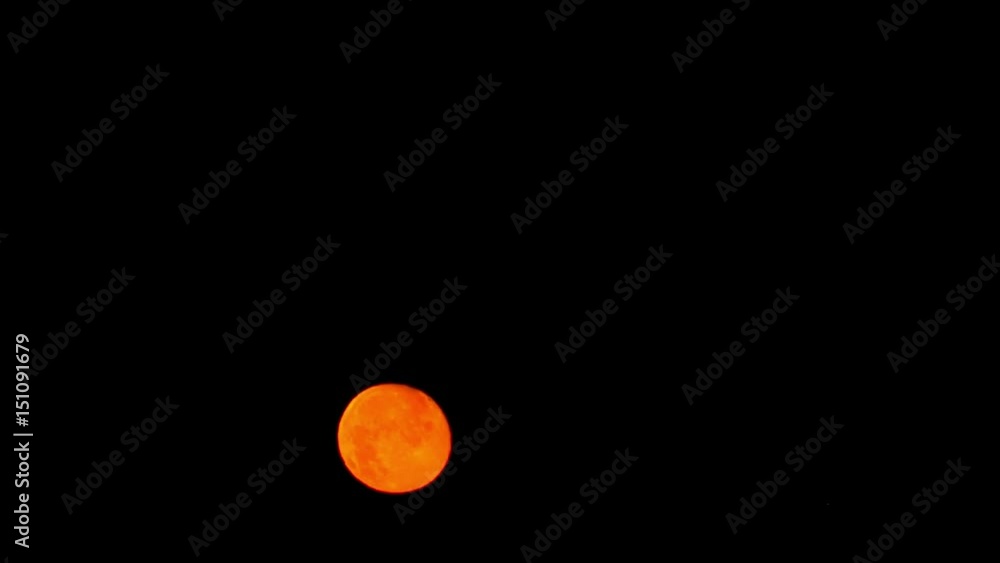 Golden Full Moon setting on the morning of July 31, 2015 in Istanbul. Red Moons, which can be caused by other sizes of dust particles or by Total Lunar Eclipses, are much more common than Blue Moons Golden Full Moon setting on the morning of July 31, 2015 in Istanbul. Red Moons, which can be caused by other sizes of dust particles or by Total Lunar Eclipses, are much more common than Blue Moons