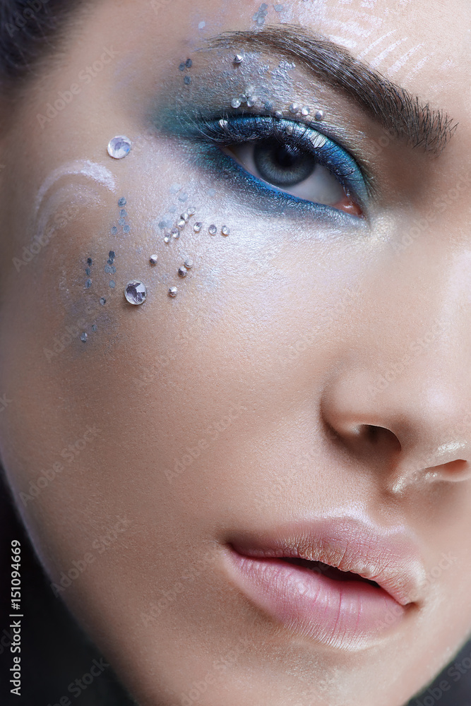 Close up beauty head shot woman with fantasy makeup Close up beauty head shot woman with fantasy makeup