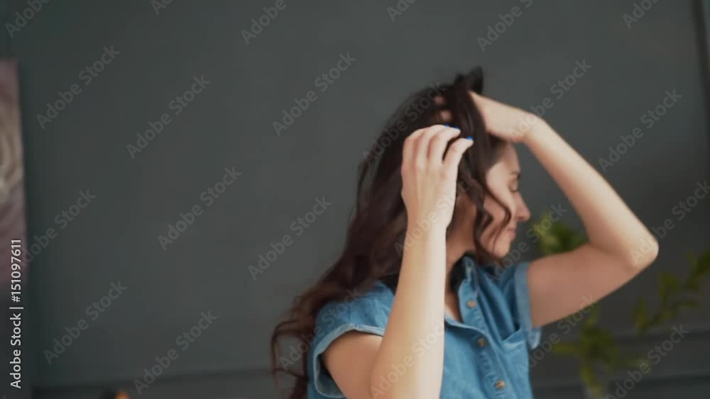 Happy young woman dancing in the room Happy young woman dancing in the room