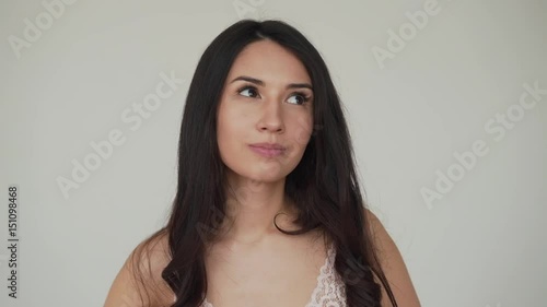 Emotional portrait, beautiful caucasian woman smiling at camera.