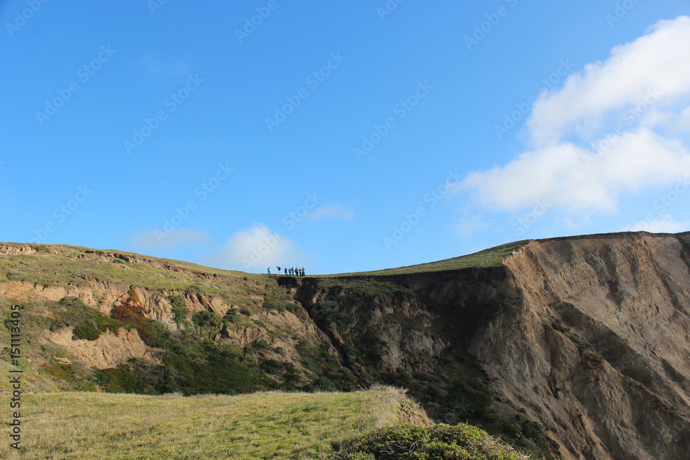Fototapeta premium People on a Cliff