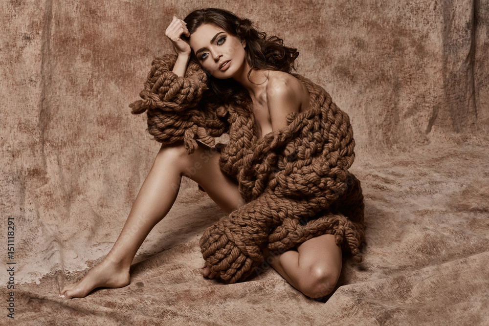 Naklejka premium Vogue style photo of unusual female model wearing wool sweater