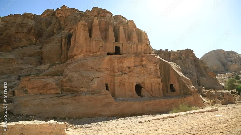 The Obelisk Tomb in ancient Petra, originally known to Nabataeans as Raqmu - historical archaeological city in Hashemite Kingdom of Jordan The Obelisk Tomb in ancient Petra, originally known to Nabataeans as Raqmu - historical archaeological city in Hashemite Kingdom of Jordan