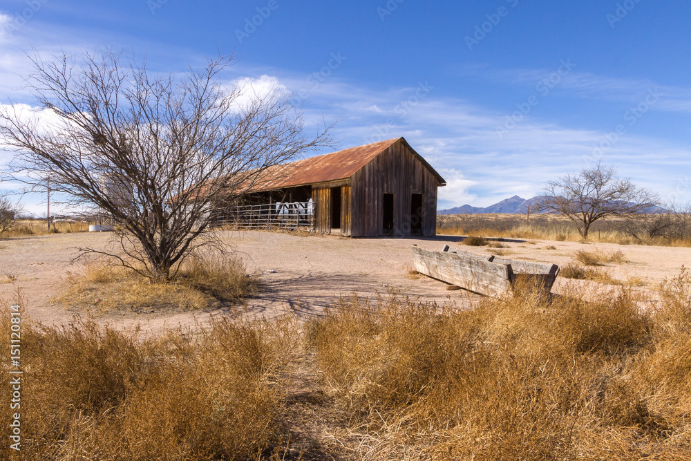 Abandoned Barn and Water Trough in Desert Abandoned Barn and Water Trough in Desert
