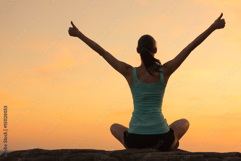 © kieferpix - Healthy woman celebrating during a beautiful sunset. Happy and Free. © kieferpix - Healthy woman celebrating during a beautiful sunset. Happy and Free.