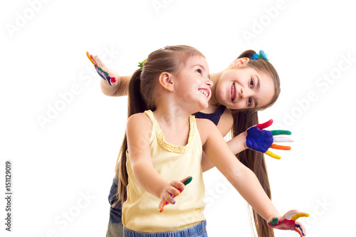 Little girls with colored hands
