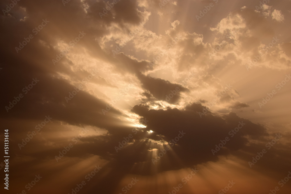 Obraz premium sun behind clouds