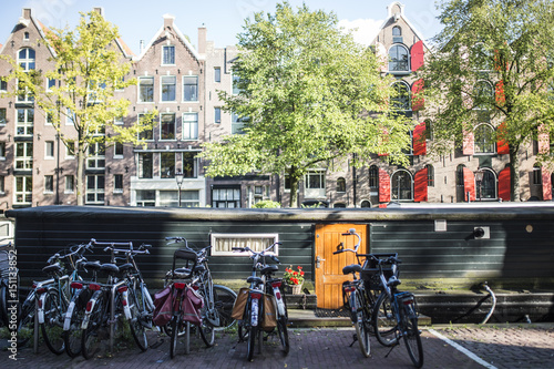 18 March 2016. Amsterdam. Netherlands. Large amounts of Bicycles at docking stands in Amsterdam during the day.