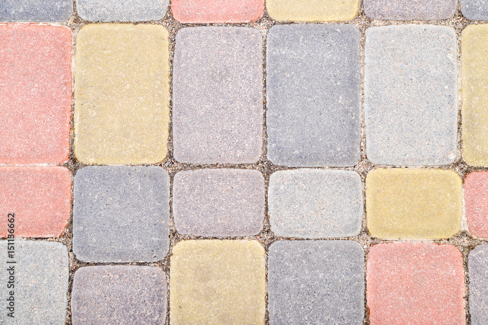 Fototapeta premium Background, texture of urban multicolored pavers on the whole frame. Horizontal frame