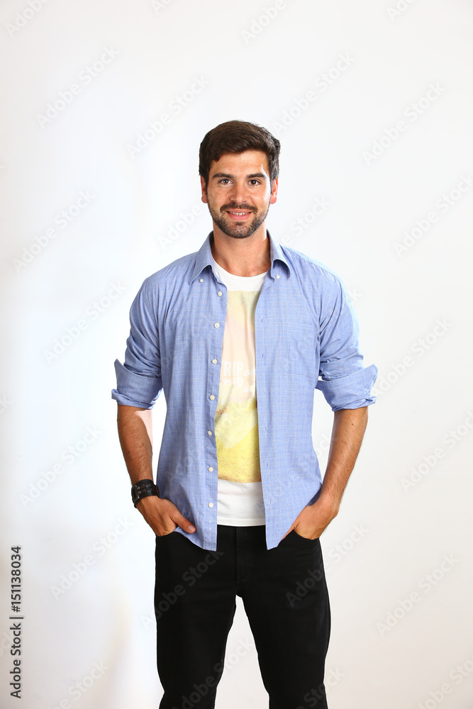 Fototapeta premium Young man is posing in a Studio