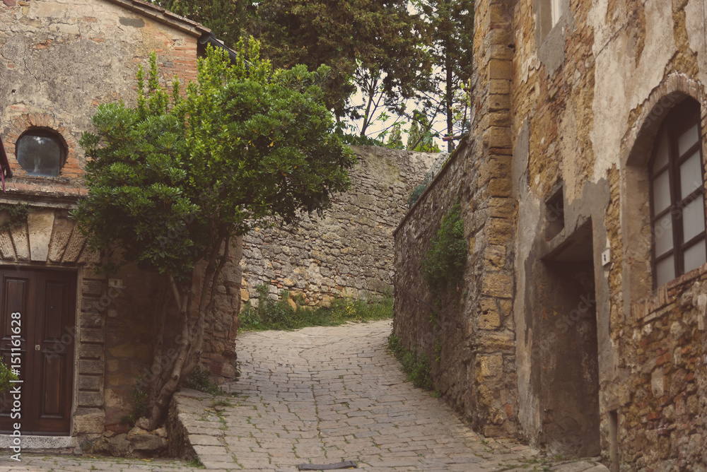View of a street of the small and famous town of Volterra, Italy. View of a street of the small and famous town of Volterra, Italy.