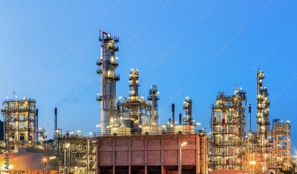 Refinery plant of a petrochemical industry at night Refinery plant of a petrochemical industry at night