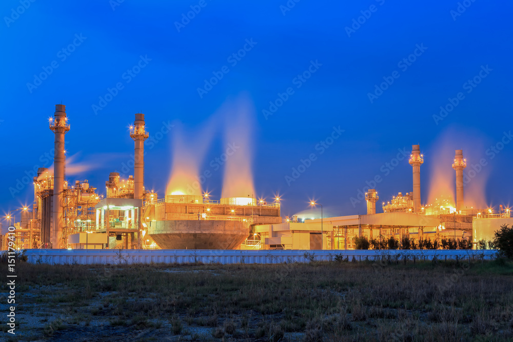 Fototapeta premium Gas turbine electrical power plant at dusk with twilight support all factory in industrial Estate 