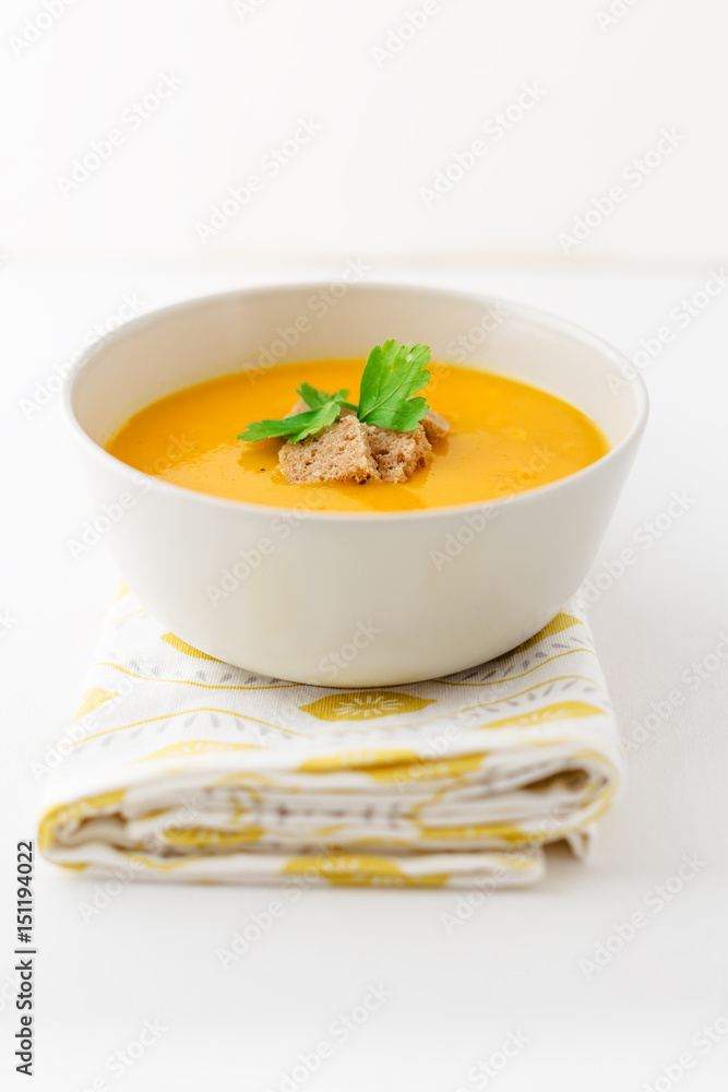 Pumpkin cream soup in a bowl Pumpkin cream soup in a bowl