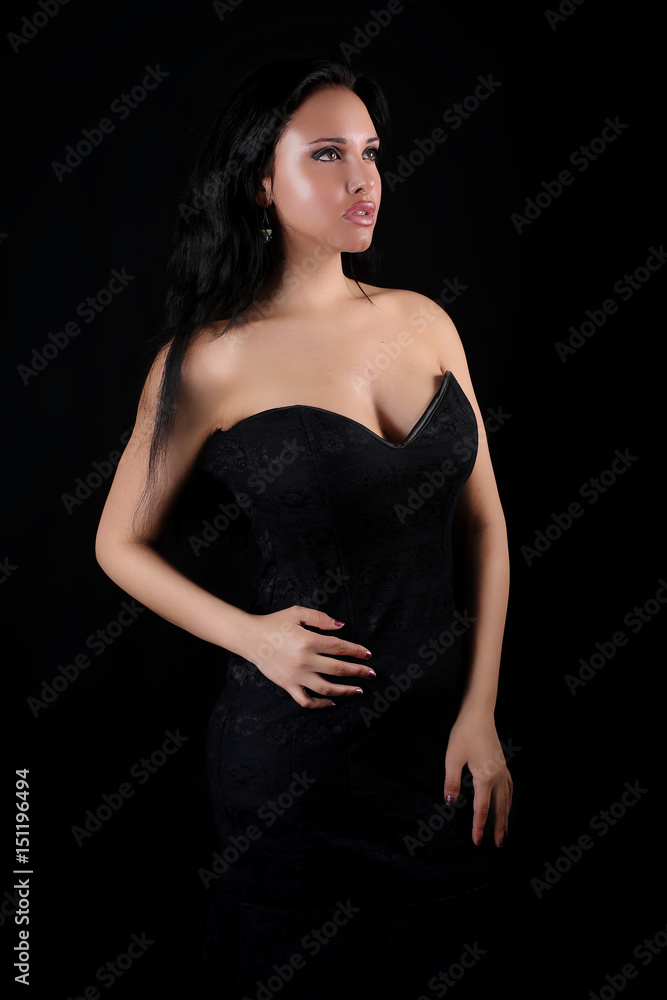 Elegant woman wearing a black dress