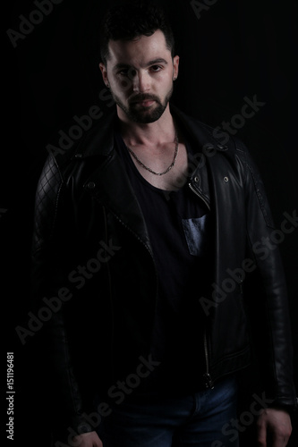 Handsome vampire wearing a black leather jacket 