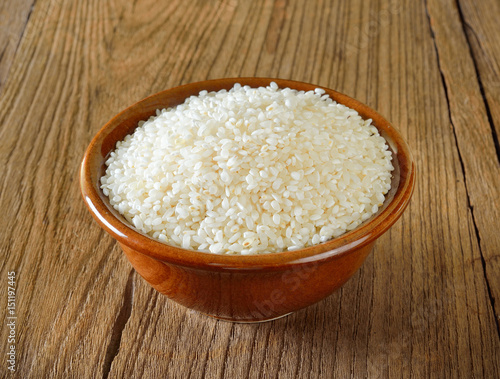 Japanese rice on wooden background