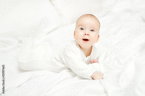 Baby Crawling, New Born Kid in White Bodysuit, Happy Little Child looking up