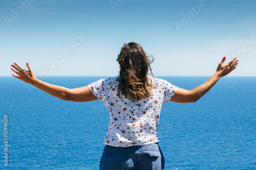 Woman enjoying ocean © click_and_photo